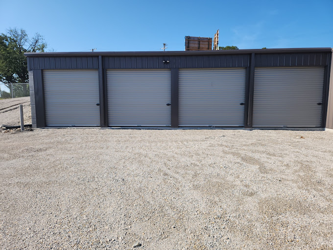 Storage Vault storage unit building with roll-up doors